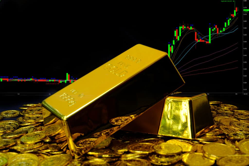 Gold bars and coins with live gold price chart — sell gold South Africa